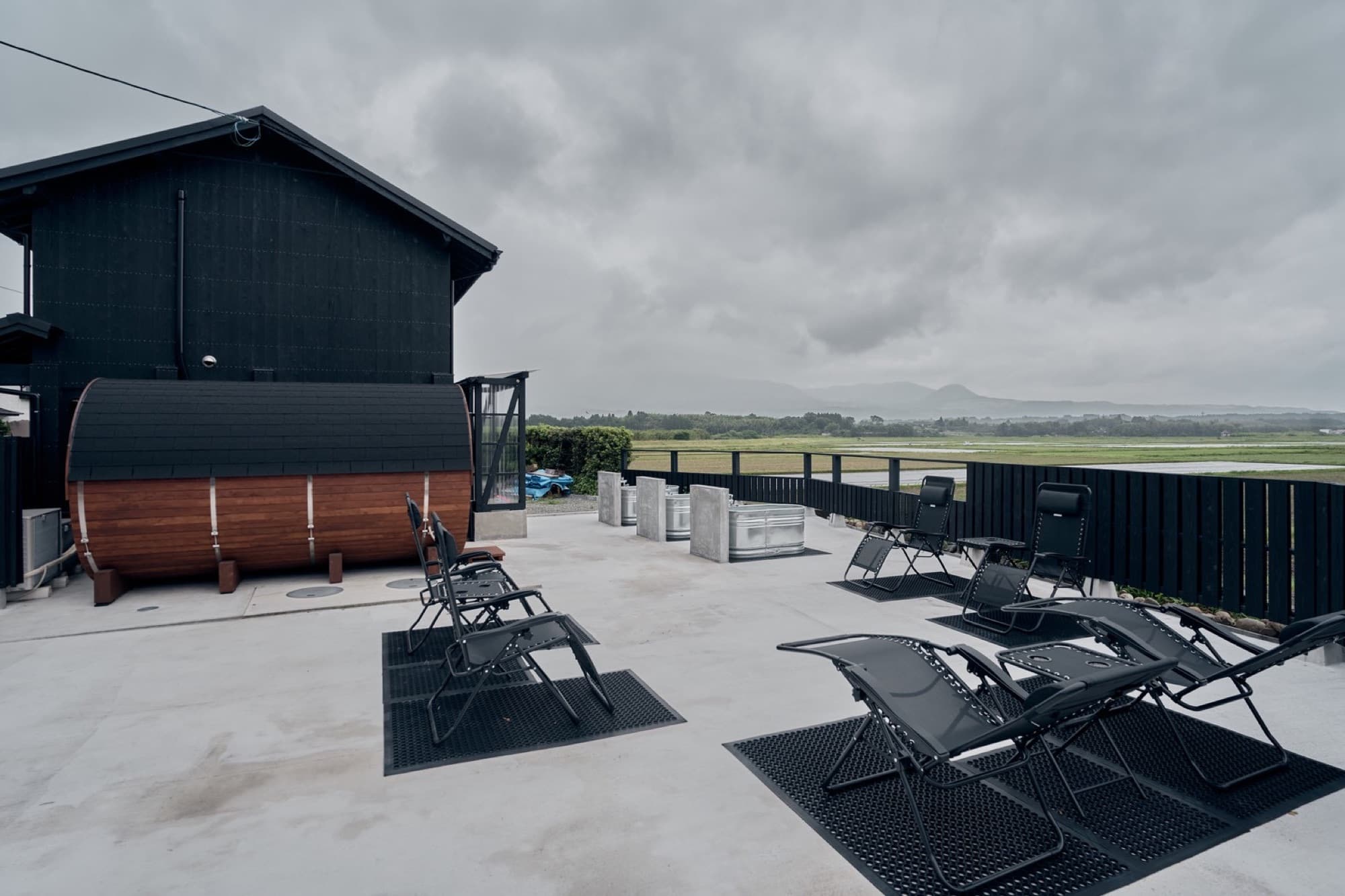 Loungers on the terrace facing the rice fields